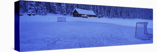 Hockey Net on a Snowcapped Landscape, Lake Louise, Alberta, Canada-null-Premier Image Canvas