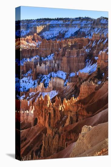 Hoodoos and Snowy Rim Cliffs Lit by Strong Late Afternoon Sun in Winter-Eleanor-Premier Image Canvas