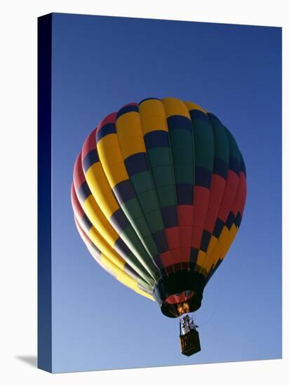 Hot Air Balloon in Flight-Paul Sutton-Premier Image Canvas