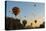 Hot Air Balloons Cruising over Cappadocia, Anatolia, Turkey, Asia Minor, Eurasia-James Strachan-Premier Image Canvas