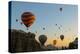 Hot Air Balloons Cruising over Cappadocia, Anatolia, Turkey, Asia Minor, Eurasia-James Strachan-Premier Image Canvas