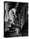 Housewife Cleaning Her Carpet with Vacuum Cleaners-Yale Joel-Premier Image Canvas