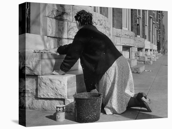 Housewife Washing Her White Stoop During Part of Her Daily Routine-Margaret Bourke-White-Premier Image Canvas