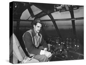 Howard Hughes Sitting at the Controls of His 200 Ton Flying Boat Called the "Spruce Goose"-J. R. Eyerman-Premier Image Canvas