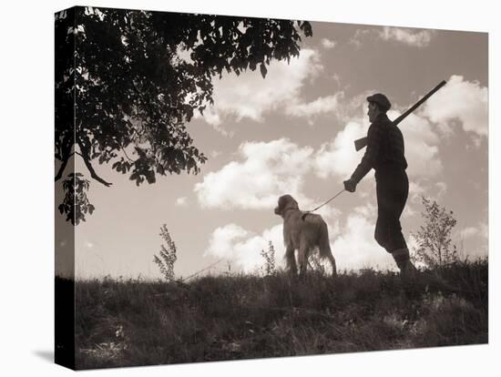 Hunter Walking with Bird Dog-Philip Gendreau-Premier Image Canvas