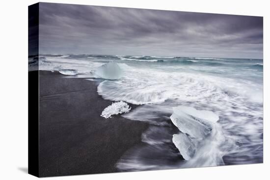 Ice on the seashore outside the Jokulsarlon lagoon, Jokulsarlon, Vatnajokull National Park-Nigel Hicks-Premier Image Canvas