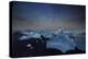 Iceberg on Black Sand Beach with Dramatic Sky-Alex Saberi-Premier Image Canvas