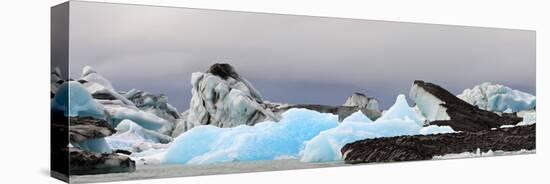 Icebergs and Volcanic Ash, Jokulsarlon Lagoon, Iceland-null-Stretched Canvas