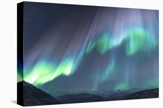 Iceland, Akureyri. The northern lights glow in unbelievable colors.-Ellen Goff-Premier Image Canvas