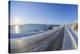 Icy coastal road with sun in winter, Buvik, Kvaloy, Troms, Norway-Raimund Linke-Stretched Canvas