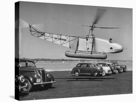 Igor Sikorsky Taking Off in Helicopter from Parking Lot-Dmitri Kessel-Premier Image Canvas