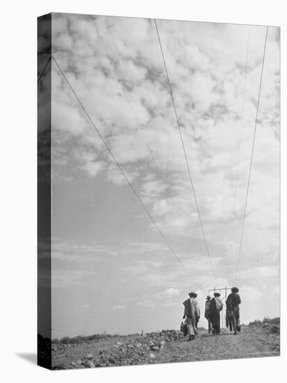 Illegal Immigrants from Mexico Following Power Lines North Into Us-Loomis Dean-Premier Image Canvas