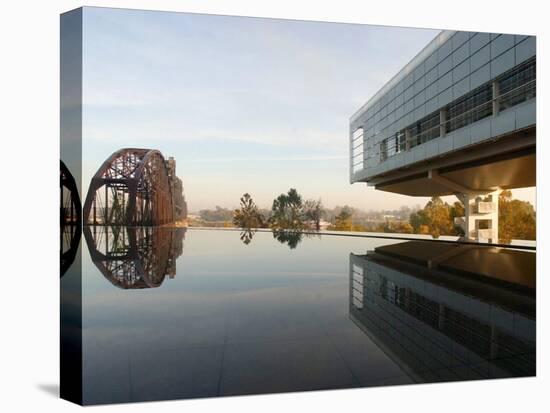 Image of the Clinton Library Building and an Old Bridge Reflected in a Pool-null-Premier Image Canvas