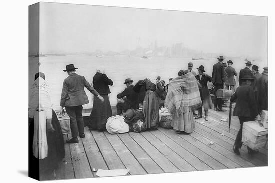 Immigrants Waiting for Ferry from Ellis Island to New York City, Oct. 20, 1912-null-Stretched Canvas