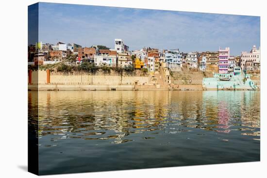 India, Uttar Pradesh. Varanasi on the Ganges River, view from river boat of Shitlo Ghat and Lal Gha-Alison Jones-Premier Image Canvas