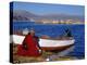 Indian Woman from the Uros or Floating Reed Islands of Lake Titicaca, Washes Her Pans in the Water -John Warburton-lee-Premier Image Canvas