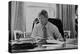 Informal Portrait of President Bill Clinton at His Desk in the Oval Office-null-Stretched Canvas