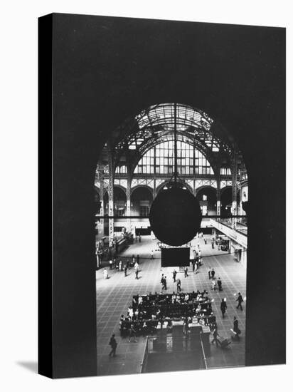 Interior of Penn Station Through Archway and Behind Suspended Clock, with Ceiling Ironwork-Walker Evans-Premier Image Canvas