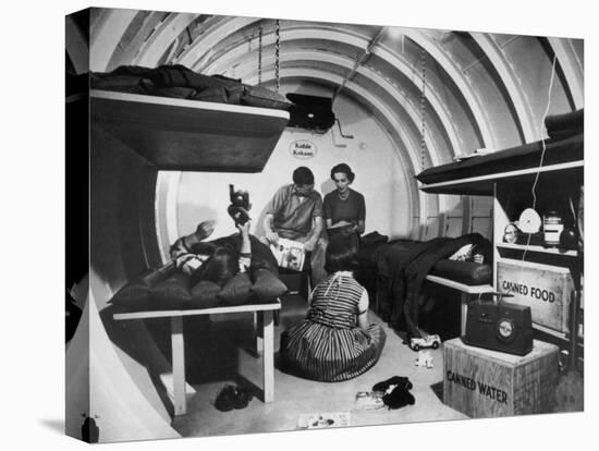 Interior View of Steel Underground Radiation Fallout Shelter Where Couple Relaxes with 3 Children-Walter Sanders-Premier Image Canvas