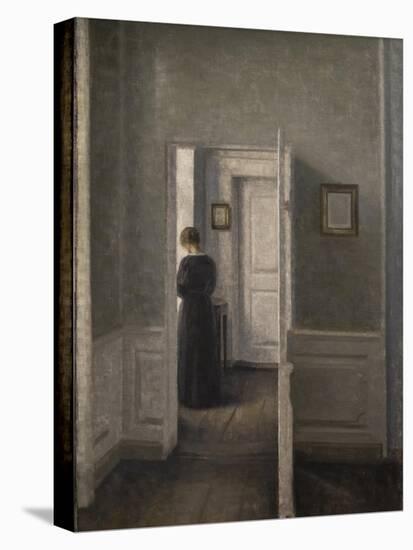 Interior with a woman standing-Vilhelm Hammershoi-Premier Image Canvas