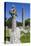 Ireland, County Wicklow, Glendalough, Celtic cross and Round Tower-Walter Bibikow-Premier Image Canvas