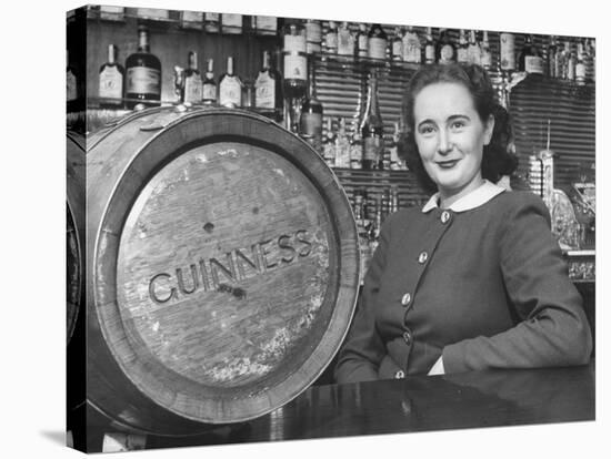 Irish Barmaid at Airport Bar with Keg of Guinness Beer-Nat Farbman-Premier Image Canvas
