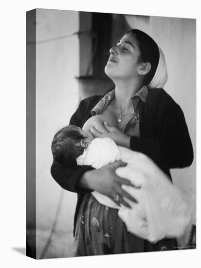 Israeli Mother Breast Feeding Her Baby-Paul Schutzer-Premier Image Canvas