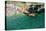 Italia, Apulia, Polignano a Mare. Crowded beach on a weekend. green.-Michele Molinari-Premier Image Canvas