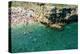 Italia, Apulia, Polignano a Mare. Crowded beach on a weekend. green.-Michele Molinari-Premier Image Canvas