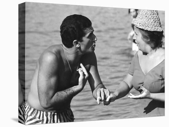 Italian Man Talking to a Woman While Enjoying a Day at the Beach-Paul Schutzer-Premier Image Canvas