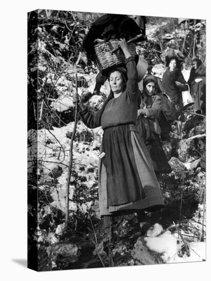 Italian Refugee Women Carrying Their Belongings in Baskets, While Fleeing Their Homes in WWII-Robert Capa-Premier Image Canvas