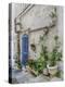 Italy, Puglia, Brindisi, Itria Valley, Ostuni. Blue door and potted plants in old town.-Julie Eggers-Premier Image Canvas