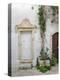 Italy, Puglia, Brindisi, Itria Valley, Ostuni. Potted plants and colorful doors in the white city.-Julie Eggers-Premier Image Canvas