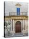 Italy, Puglia, Brindisi, Itria Valley, Ostuni. Wooden door with balcony above and blue shutters.-Julie Eggers-Premier Image Canvas