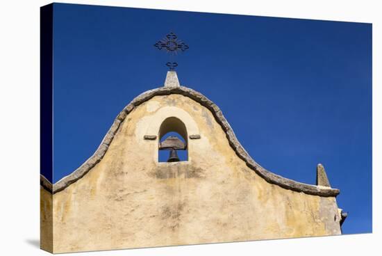 Italy, Sardinia, Gavoi. the Bell and Cross of an Old Church, Backed by a Blue Sky-Alida Latham-Premier Image Canvas
