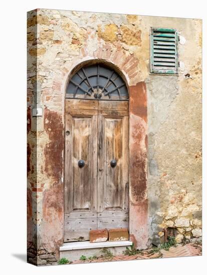 Italy, Tuscany, Pienza. Old wooden door along the streets.-Julie Eggers-Premier Image Canvas