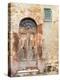 Italy, Tuscany, Pienza. Old wooden door along the streets.-Julie Eggers-Premier Image Canvas