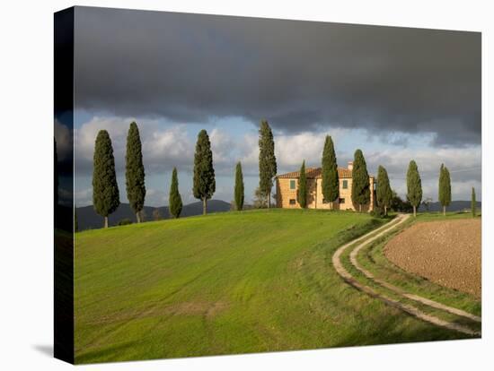 Italy, Tuscany, Pienza. Tuscan Farmhouse with Stormy Clouds-Julie Eggers-Premier Image Canvas