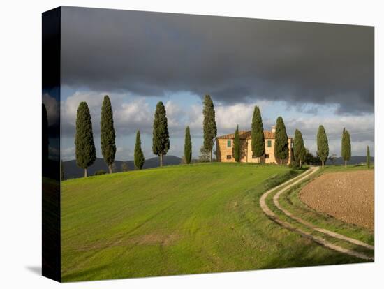 Italy, Tuscany, Pienza. Tuscan Farmhouse with Stormy Clouds-Julie Eggers-Premier Image Canvas