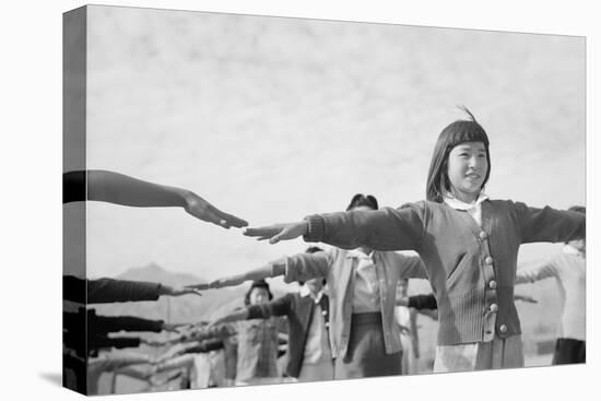 Japanese-American girls exercising at Manzanar, 1943-Ansel Adams-Premier Image Canvas