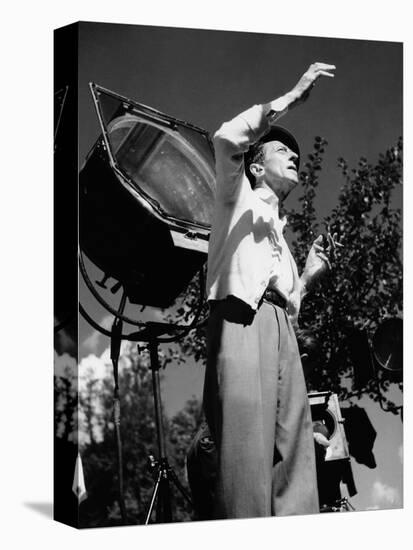 Jean Cocteau on the set of 'La Belle et La Bete', 1946 (b/w photo)-French Photographer-Stretched Canvas