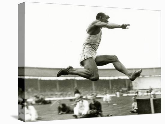 Jesse Owens in Action at the Long Jump During the Berlin Olympics, 1936-null-Premier Image Canvas