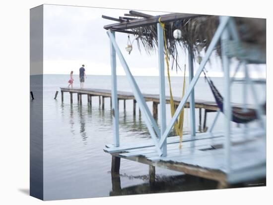 Jetty and Hammocks, Caye Caulker, Belize-Russell Young-Premier Image Canvas