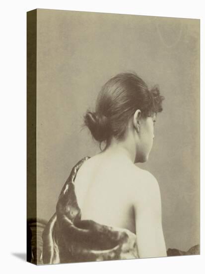 Jeune femme de trois -quarts dos, coiffée d'un chignon en buste-null-Premier Image Canvas