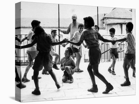 Jewish Children at Religious School Dancing Israel Folk Dances at Recess-Paul Schutzer-Premier Image Canvas