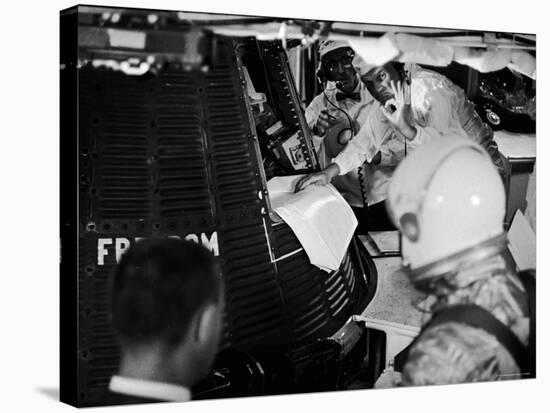 John Glenn Checking Out Mercury Capsule That Will Launch Alan Shepard into Space-Ralph Morse-Premier Image Canvas