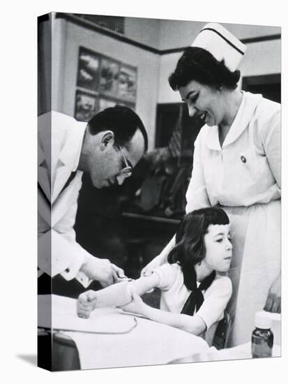 Jonas E. Salk Inoculating Child with Polio Vaccine He Developed, Ca. 1955-null-Stretched Canvas