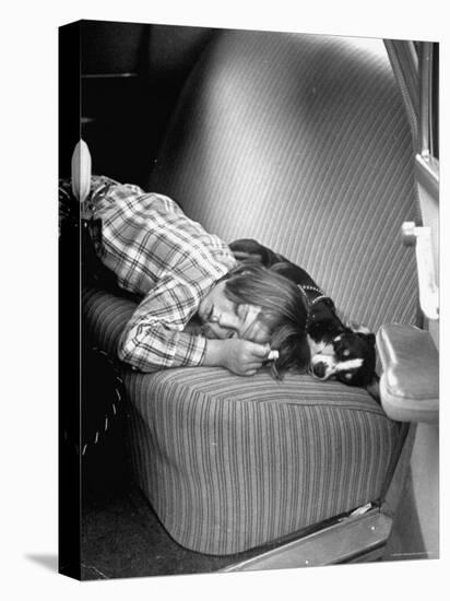 Judy Gordon Lying on Car Seat, Woozy with Car Sickness-Allan Grant-Premier Image Canvas