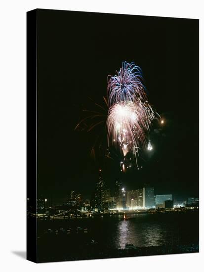 July 4, 1959: View of a Fireworks Display Above the Detroit River, Detroit, Michigan-Stan Wayman-Premier Image Canvas