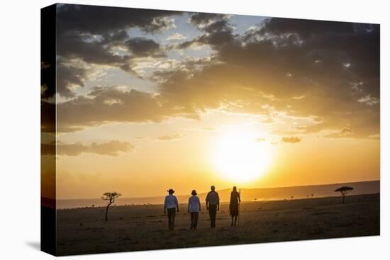 Kenya, Mara North Conservancy. a Couple on an Evening Walking Safari with their Guide and Maasai.-Niels Van Gijn-Premier Image Canvas